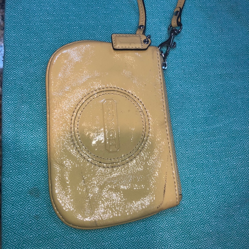 COACH yellow wristlet